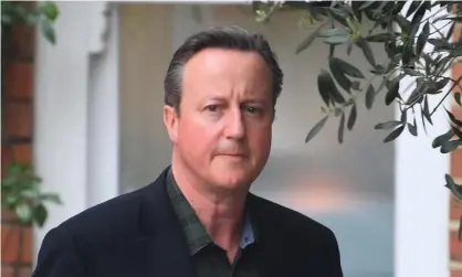  ?? Photograph: Victoria Jones/PA ?? David Cameron leaves his home before giving evidence to the Treasury committee investigat­ing the collapse of Greensill Capital in May.