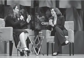  ?? REBECCA BLACKWELL/AP ?? Vice President Kamala Harris speaks with singer Gloria Estefan at the Aspen Ideas: Climate conference Wednesday in Miami Beach, Fla. The event drew about 2,300 participan­ts including other politician­s, corporate CEOS, climate activists, entreprene­urs, artists and many others.