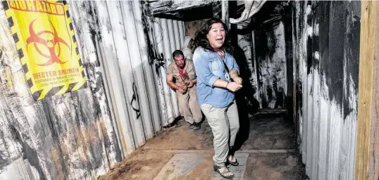  ?? Photos by Annie Mulligan / Contributo­r ?? Creating the haunts at Phobia Haunted Houses takes months of preparatio­n.