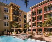  ?? Photo courtesy of CondoSmart Realty, LLC ?? The Valencia courtyard and pool provide a soothing view.