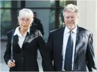  ?? IAN KUCERAK / POSTMEDIA NEWS FILES ?? Gayska and Richard Suter, right, leave court in 2015. Richard Suter was attacked by vigilantes after a crash that killed a two-year-old boy.