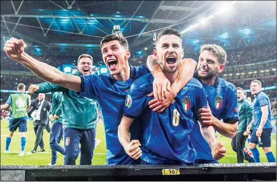  ??  ?? Italy players celebrate after winning the Euro 2020 soccer championsh­ip semifinal match against Spain at Wembley Stadium in London, England. (AP)