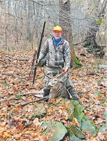  ?? PROVIDED ?? Chuck Roberts with the buck he arrowed using a longbow during Indiana’s firearm deer season.