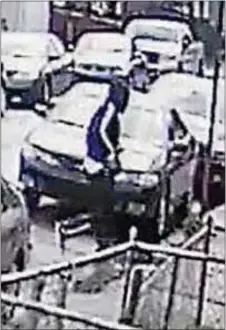  ?? SUBMITED PHOTO ?? This image from a surveillan­ce camera shows the man suspected in the shooting in Upper Darby on Tuesday morning.