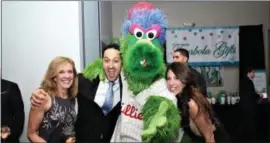  ??  ?? Guests celebrate with the Phanatic.