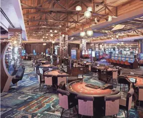  ??  ?? The 125,000-square-foot casino at MGM Springfiel­d in Massachuse­tts features 2,550 slots, 120 table games, a high-limit room and a poker room with 23 tables.