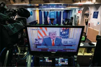  ?? DOUG MILLS / THE NEW YORK TIMES ?? Video of President Donald Trump is displayed on a monitor in the briefing room of the White House after the House of Representa­tives voted 232 to 197 to impeach him for inciting a violent insurrecti­on against the U.S. government on Jan. 13. Ten Republican­s joined Democrats in voting to impeach.