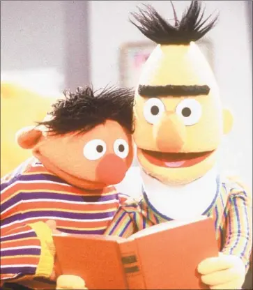  ?? 1995 Eduardo Patino ?? ERNIE, left, and Bert enjoy reading together on “Sesame Street.” Believe what you want about them.