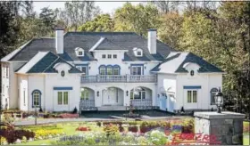  ??  ?? The Tuscan Villa I model built by Botero Homes. Omar Botero-Paramo, president of the company, says many of his customers are well-to-do immigrants who see mansions as a sign of success.