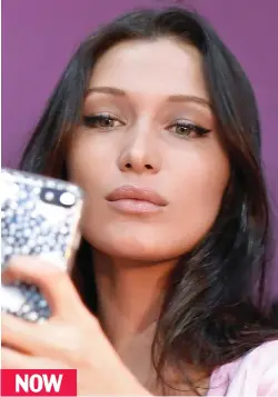  ??  ?? Toothless: US model Bella Hadid poses for a sultry selfie NOW
