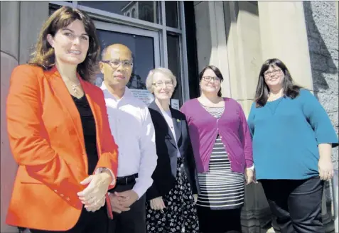  ?? — Photo By Lillian Simmons /Special to The Telegram ?? Staff at the Family Life Bureau stop outside their offices for a photo — (from left) Katrina Etchegary, Lito Libres, Loretta Walsh, Catherine Tangsley and Denise Sergeant.