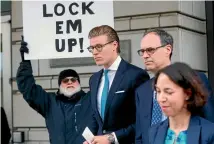  ?? PHOTO: AP ?? Alex van der Zwaan, second from left, leaves Federal District Court in Washington.