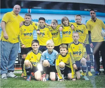  ?? ?? Harrison (back row 2nd player from the right) with the Wisbech St Mary team