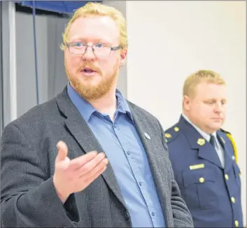  ?? KATHY JOHNSON ?? Shelburne town CAO Dylan Heide makes a point during the policing services public informatio­n and input session at the Shelburne Community Centre on Feb. 20. In the background is acting chief for Bridgewate­r Police Services, Scott Feener.