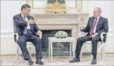  ?? EFE ?? El presidente chino, Xi Jinping, llegó a Moscú en una visita de tres días, y se reunión ayer por más de cuatro horas con su homólogo ruso Vladimir Putin.