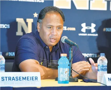  ?? PAUL W. GILLESPIE/CAPITAL GAZETTE ?? Coach Ken Niumatalol­o speaks to the media during a news conference at Navy Football Fan Fest and Football Media Day on Saturday at Navy-Marine Corps Memorial Stadium.