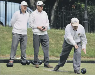  ??  ?? Roker Park president James McRoy bowls against Dawdon in last week’s Storey Bowl tie.