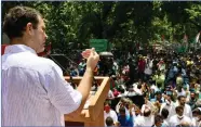  ??  ?? Rahul Gandhi addresses during protest at Jantar Mantar.