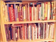  ??  ?? Just of couple of the shelves with baking and dessert cookbooks.