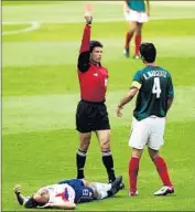  ?? Shaun Botterill Getty Images ?? MEXICO’S Rafael Marquez is sent off in 2002 World Cup game for head-butting Cobi Jones of the U.S.