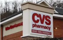  ?? AP FILE ?? THAT WAS EASY: CVS is opening up 10 drive-thru coronaviru­s test sites today, with more to follow, as part of a plan to make testing available to everyone. These self-adminsiste­red tests are in addition to drive-up tests being done elsewhere by staff members.