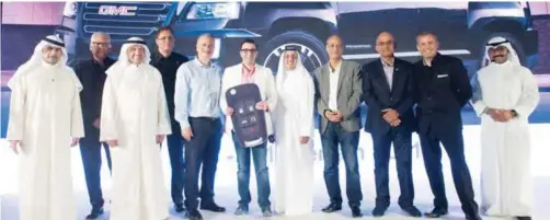  ??  ?? Grand prize winner Ahmed Fadel with ABK’s Executive Management.