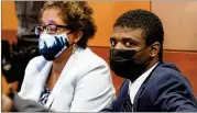  ?? NATRICE MILLER/AJC ?? Jayden Myrick (right) and his defense attorney Gina Bernard appear in court in January for jury selection at Fulton County Courthouse.