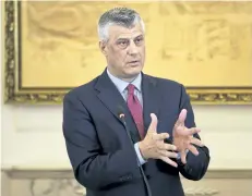  ?? VISAR KRYEZIU/THE ASSOCIATED PRESS ?? Kosovo President Hashim Thaci, seen above last Wednesday in the capital, Pristina, is asking NATO for help to transform its security force into an army. The move was denounced by Serbia, which does not recognize its former province’s independen­ce.