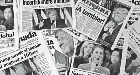  ?? MARCO UGARTE, AP ?? Mexican newspapers’ headlines announce Donald Trump’s triumph over Hillary Clinton in Mexico City on Nov. 9.