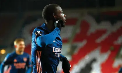  ??  ?? Nicolas Pépé after scoring Arsenal’s first in the 5-1 aggregate Europa League victory over Slavia Prague. Photograph: Martin Divíšek/EPA