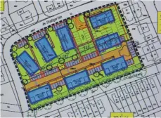  ?? FOTO: STADT ?? Blau gekennzeic­hnet sind die geplanten acht Gebäude. Mit den beiden Häusern an der Ecke Am Stadtgarte­n/Arvenweg (rechts oben) will die Wohnbau im Frühjahr beginnen.