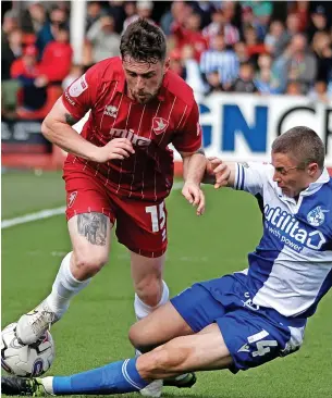  ?? ?? Cheltenham Town’s Will Ferry and Bristol Rovers’ Jordan Rossiter