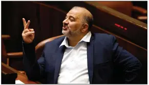  ?? (AP/Ariel Schalit) ?? Mansour Abbas attends a Knesset session last year. Abbas, head of the Islamist Arab Ra’am party, a key Israeli governing partner, said Wednesday that said he would continue his party’s membership in the country’s fragile coalition.