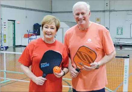  ?? SUBMITTED ?? Danville Mayor Phil Moudy and his wife, Mary Ann, both 68, play pickleball several times a week, including every Tuesday night at the Danville Middle School gym. Moudy said it’s a growing sport, and he is proposing a four-court pickleball complex for...