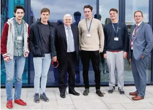  ??  ?? ●● Poynton High sixth form students Alexey Beganov, Tom Reddy, James Robinson and Jack Peacock with Lord Goddard and Richard Hardman