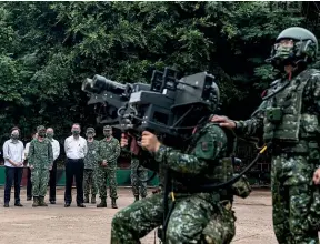  ?? AP ?? Taiwan’s President Tsai Ing-wen watches an air defence drill during a visit to a naval station this week. The US is to supply Taiwan with more than US$1 billion worth of new weapons.