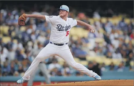  ?? Photograph­s by Allen J. Schaben Los Angeles Times ?? ROOKIE CALEB FERGUSON is a 38th-round draft pick who had never pitched above Class A before this season. After six weeks in double A, he moved up to the big leagues, where he has an ERA of 2.16 with 30 strikeouts and four walks with the Dodgers.