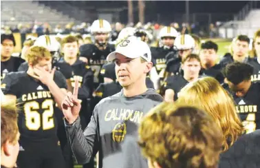  ?? STAFF FILE PHOTO BY MATT HAMILTON ?? Calhoun football coach Clay Stephenson’s Yellow Jackets beat Ware County 49-42 in dramatic fashion in the second round of the GHSA Class AAAAA playoffs Friday night in Waycross, Ga.