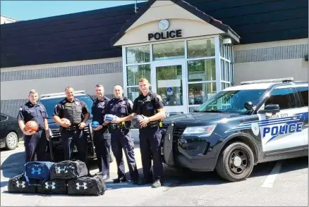  ?? ONEIDA CITY POLICE DEPARTMENT ?? Oneida City Police Department recently received a donation of duffel bags filled with sporting equipment to keep in their patrol cars to engage with local youth. July 2021.