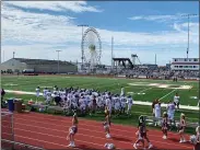  ?? COURTESY MARISSA CERATO ?? The Pottsgrove football team had a unique backdrop of a ferris wheel on the Ocean City, N.J., boardwalk for its win Saturday over Lansdale Catholic.