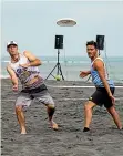  ??  ?? Co-directors of the Oakura Classic Beach Ultimate Tournament Ben Pollard and John Fernando go up against each other.