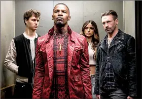  ??  ?? The heist is on: Ansel Elgort (from left), Jamie Foxx, Eiza Gonzalez and Jon Hamm are ready to
do the deed in Baby Driver.