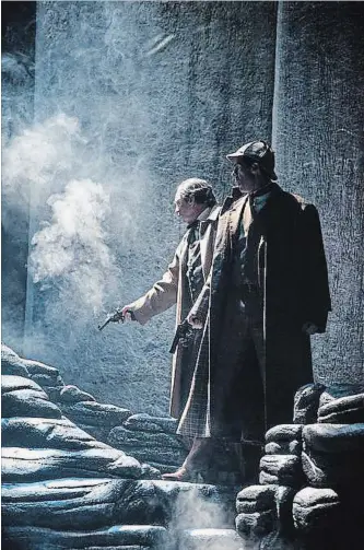  ?? EMILY COOPER SHAW FESTIVAL ?? Ric Reid, left, as Dr. Watson and Damien Atkins as Sherlock Holmes star in the Shaw Festival’s production of “The Hound of the Baskervill­es.” It opened at the Festival Theatre Saturday.