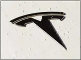  ??  ?? This file photo shows a Tesla logo in Salt Lake
City. (AP)