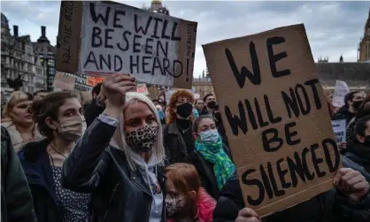  ?? Photograph: Dan Kitwood/Getty Images ?? A protest near the Houses of Parliament against the police, crime, sentencing and courts bill.