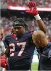  ?? Yi-Chin Lee / Houston Chronicle ?? Texans running back D’Onta Foreman had to wave goodbye to his season after getting hurt.