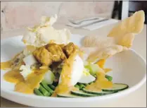  ??  ?? The Gado Gado salad, served with a peanut dressing, is a pleasant dish, best described as world comfort food.