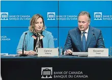  ?? JUSTIN TANG THE CANADIAN PRESS ?? Bank of Canada governor Stephen Poloz, right, announces rate hike.