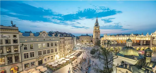  ?? — GETTY IMAGES FILES ?? The market square in Krakow is the place to be at Christmas when decoration­s go up and Poles get into the holiday spirit.