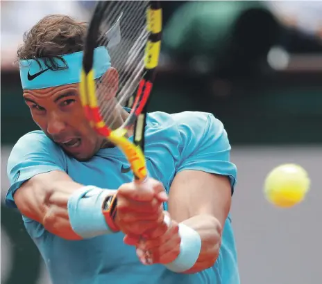  ?? EPA ?? Spain’s Rafael Nadal beat Maximilian Marterer of Germany 6-3, 6-2, 7-6 yesterday to share a record 12th entry into the quarter-finals at Roland Garros along with Novak Djokovic. Nadal has also won 37 consecutiv­e sets at the French Open venue
